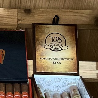 708 Cigar Brand Robusto Connecticut box on the shelf at Glen Smoke Shop