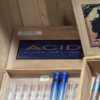 Acid Kuba Deluxe box on the shelf at Glen Smoke Shop