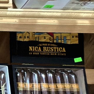Nica Rustica La Gran Fabrica Drew Estate box on the shelf at Glen Smoke Shop