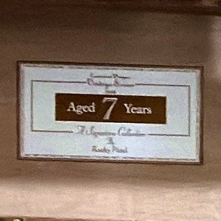 Rocky Patel Aged 7 Years — The Signature Collection box on the shelf at Glen Smoke Shop