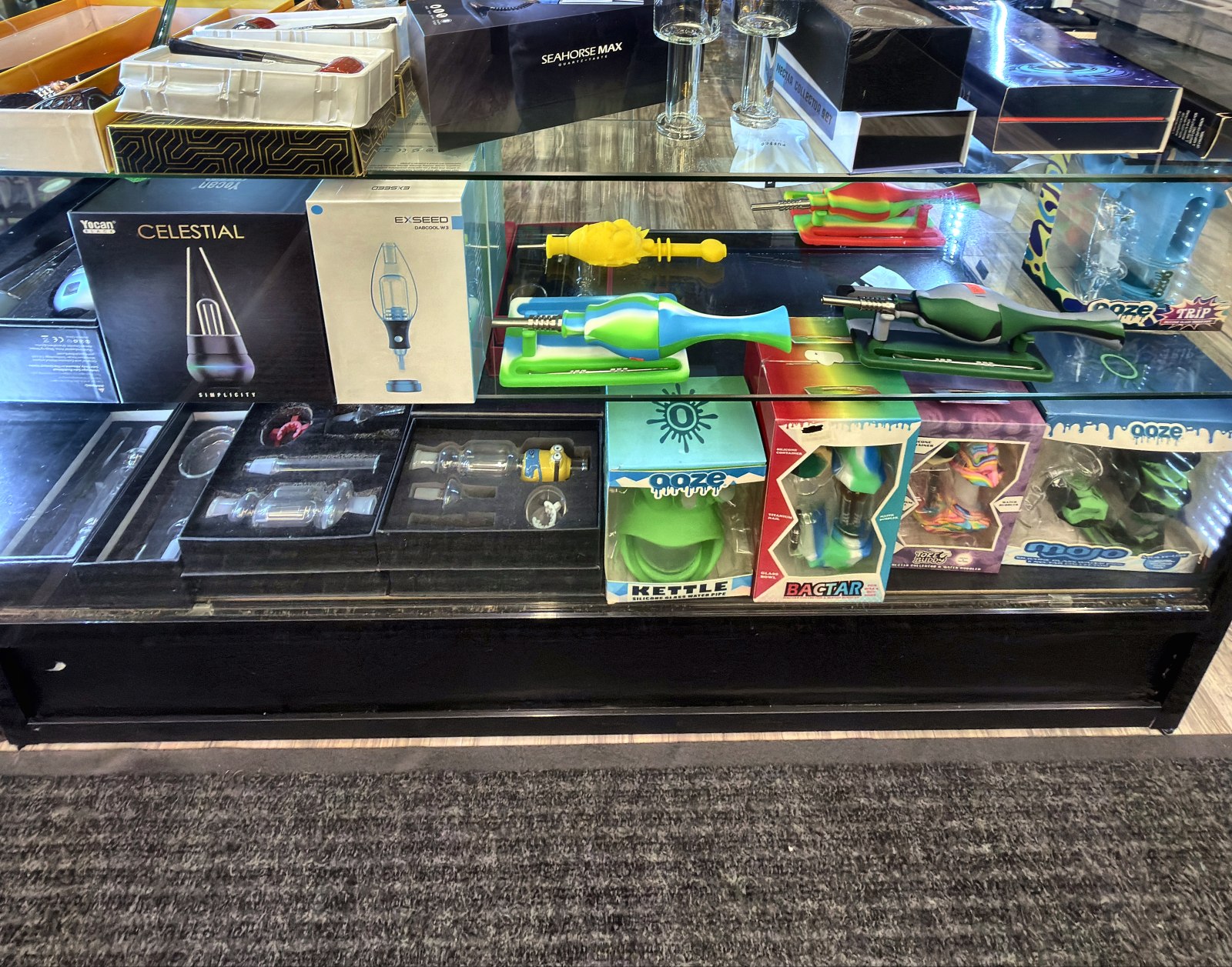 Display case of dab rigs, nectar collectors and silicone pieces