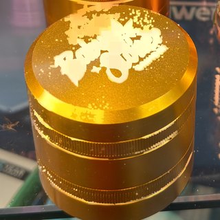 Baby Stoner Matte Gold 4-Piece Grinder on the shelf at Glen Smoke Shop