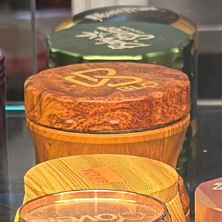 Burnt-Orange Marbled Grinder on the shelf at Glen Smoke Shop