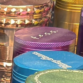 f.e.s.s. Magenta-to-Violet 4-Piece Grinder on the shelf at Glen Smoke Shop