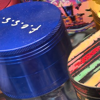 f.e.s.s. Deep Blue 4-Piece Grinder on the shelf at Glen Smoke Shop