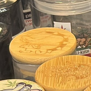 Glass Jar with Laser-Etched Bamboo Lid on the shelf at Glen Smoke Shop