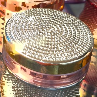 Gold Beaded-Lid 4-Piece Grinder with Window on the shelf at Glen Smoke Shop