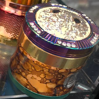 Rhinestone-Bezel Rainbow 4-Piece Grinder on the shelf at Glen Smoke Shop
