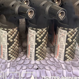 Snake-Scale Print Jet Torch Lighter on the shelf at Glen Smoke Shop