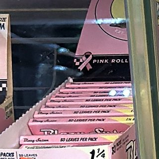 Blazy Susan Pink Rolling Papers 1 1/4 on the shelf at Glen Smoke Shop