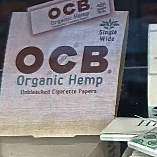 OCB Organic Hemp Organic Hemp Single Wide Rolling Papers on the shelf at Glen Smoke Shop