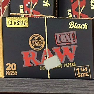 RAW Black Cone 1 1/4 Size Cones (20 per pack) on the shelf at Glen Smoke Shop