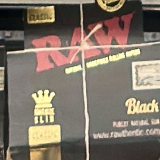 RAW Black King Size Slim Rolling Papers on the shelf at Glen Smoke Shop