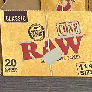 RAW Classic Cone 1 1/4 Size Cones (20 per pack) on the shelf at Glen Smoke Shop