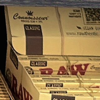 RAW Classic Connoisseur Connoisseur King Size Slim + Tips on the shelf at Glen Smoke Shop