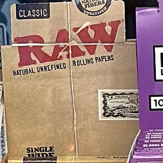 RAW Classic Single Wide Rolling Papers on the shelf at Glen Smoke Shop