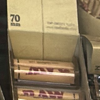 RAW Hemp Plastic Cigarette Rolling Machine 70 mm on the shelf at Glen Smoke Shop