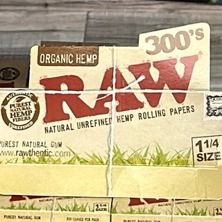 RAW Organic Hemp 300's 300's 1 1/4 Rolling Papers on the shelf at Glen Smoke Shop
