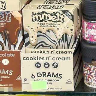 mmelt Magic Mushroom Chocolate Bar Cookies n' Cream on the shelf at Glen Smoke Shop