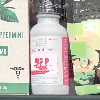 naturefine+ CBD Love Drops Berry on the shelf at Glen Smoke Shop