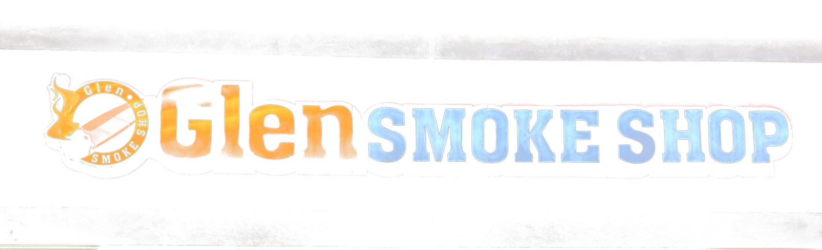 The illuminated Glen Smoke Shop sign above the storefront at 944 Roosevelt Road