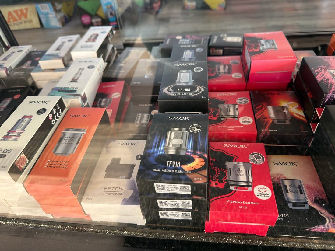 SMOK replacement coils and pod packs on the hardware shelf