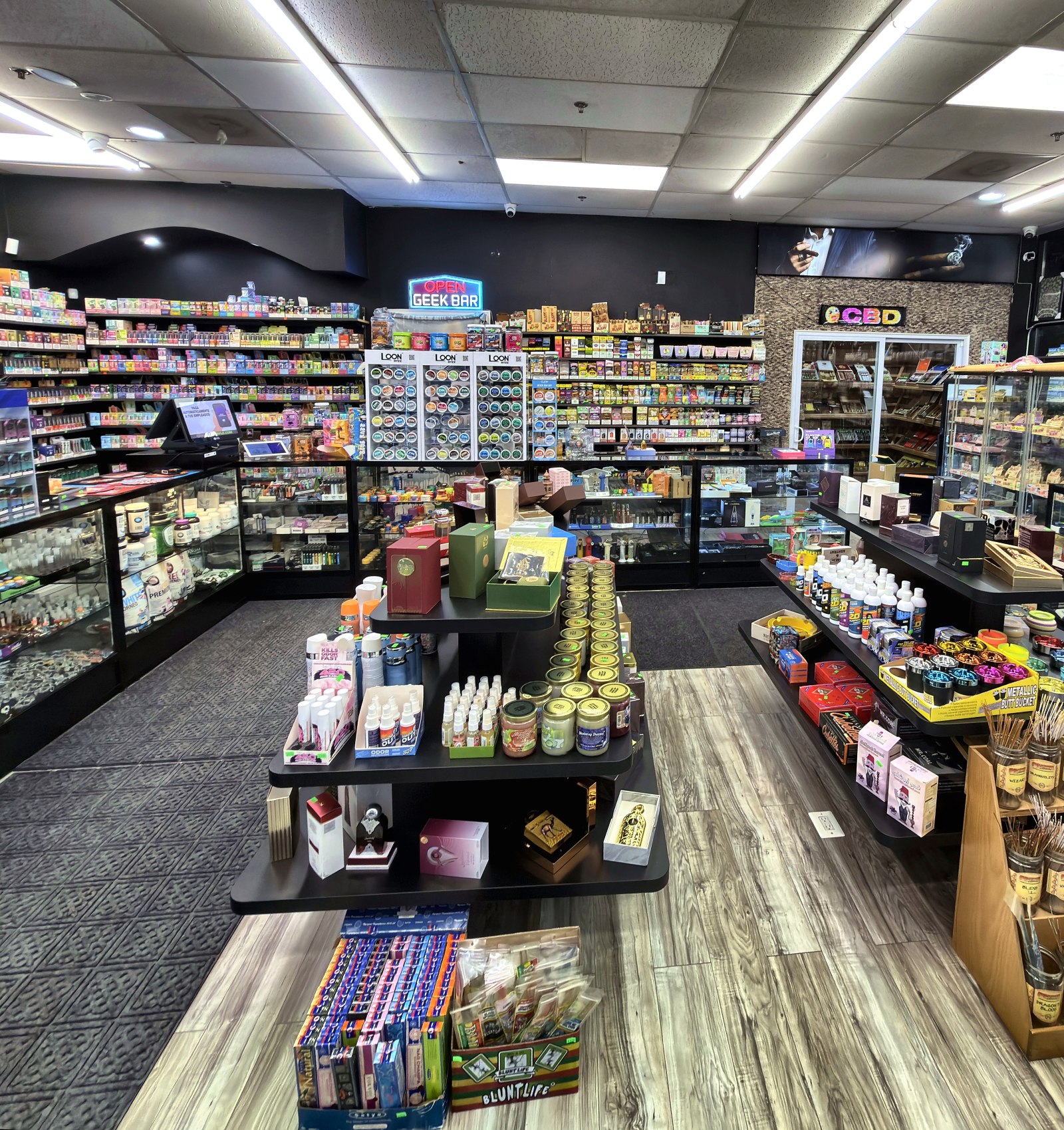 Product shelving and centre display at Glen Smoke Shop