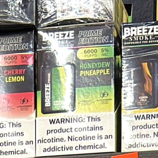 Breeze Smoke Prime Edition 6000 Honeydew Pineapple on the shelf at Glen Smoke Shop