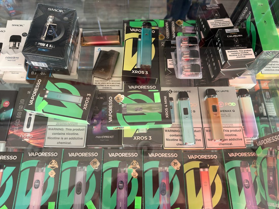 Vaporesso XROS pod kits on display in the hardware case