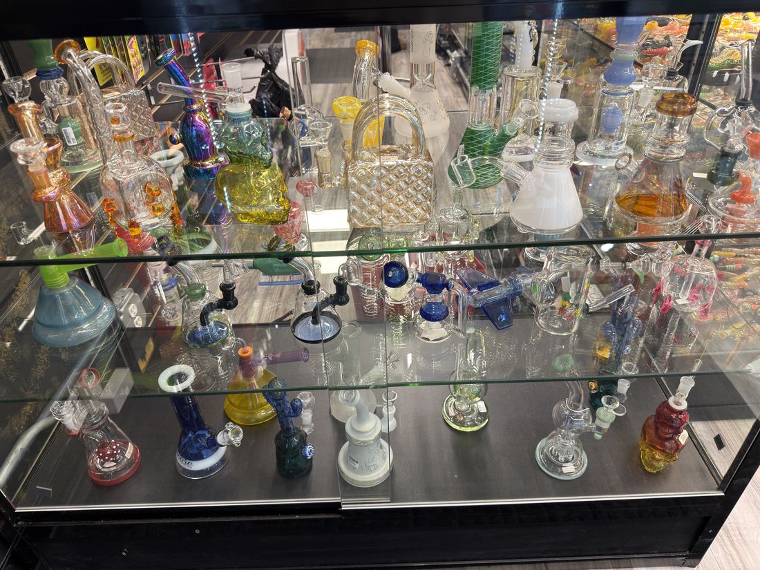 A full case of hand-blown water pipes and bubblers