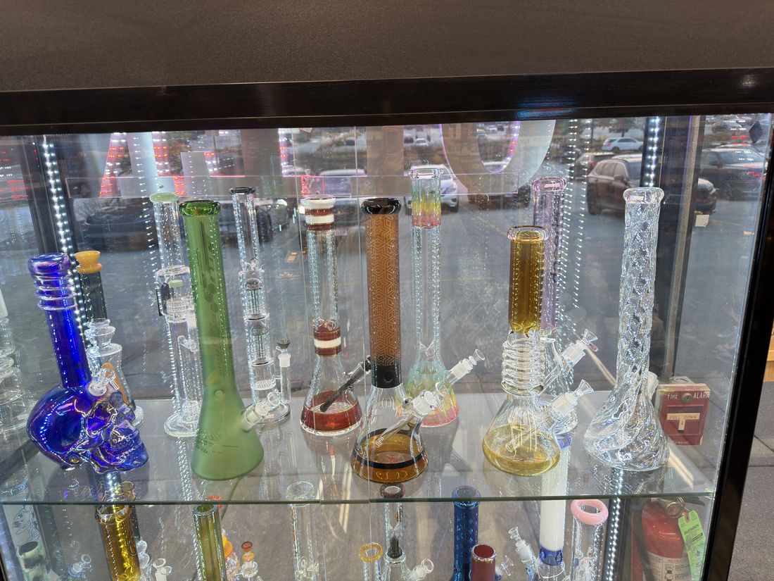 Tall straight-tube water pipes in the display case
